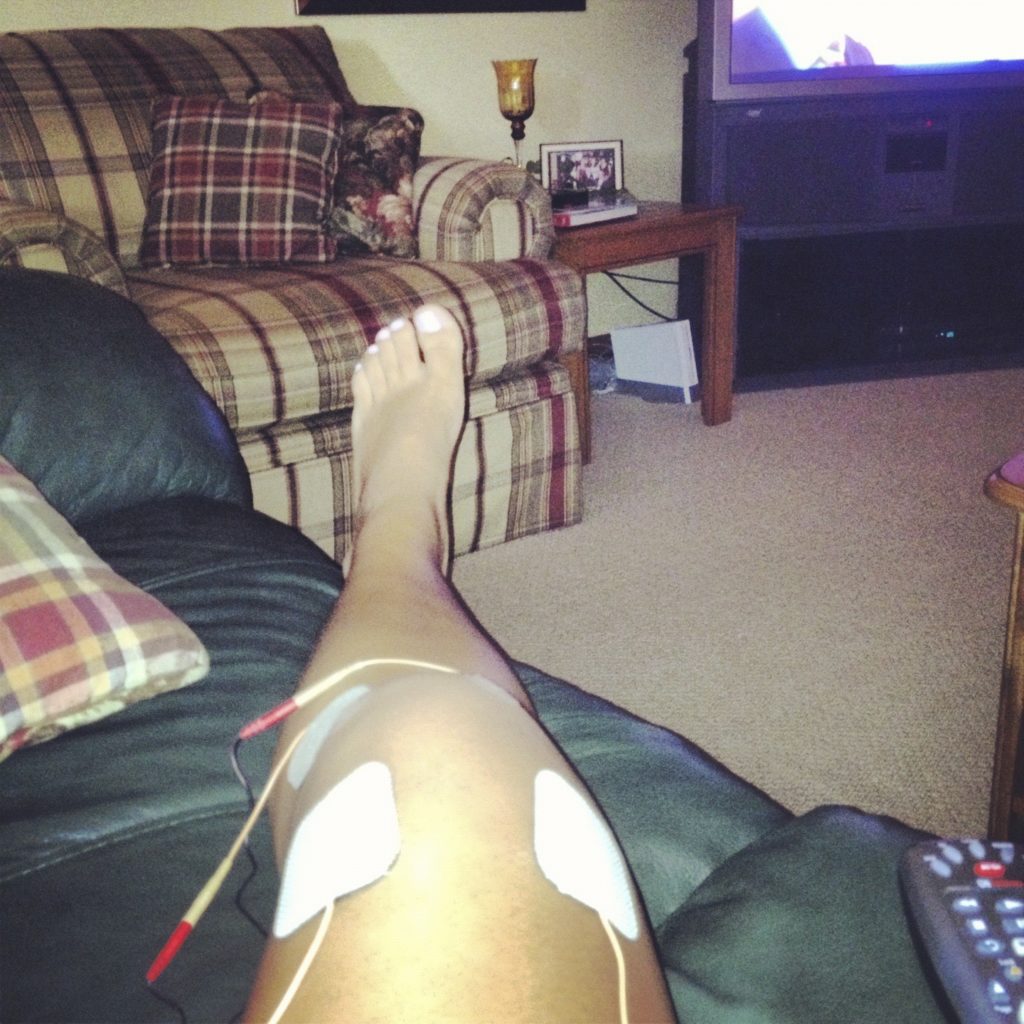 Summer 2012 set up - stim machine on leg, propped up on the love seat, watching the London 2012 Olympics. If only I had a pic of my brother laying on the couch! 